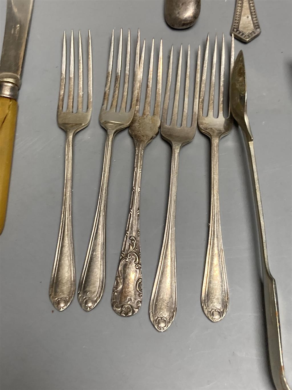 Four silver condiments, two silver thimbles, two Indian? salts and assorted plated flatware etc.